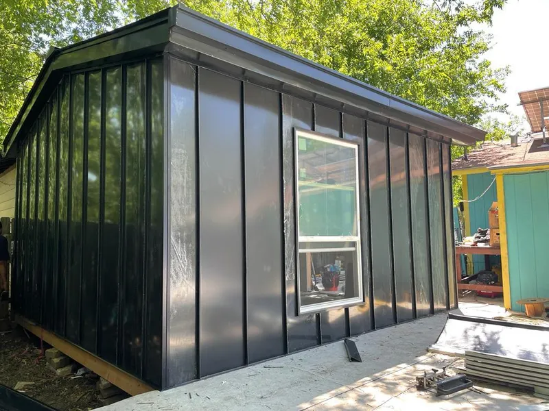 Black standing seam metal wall panels for Metal Roof Installation in Nellis AFB